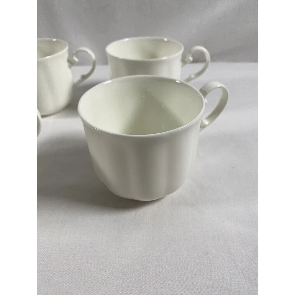 Lot of 4 Mikasa Bone Chine Cameo White Teacup Tea Cup Coffee Cup A7000